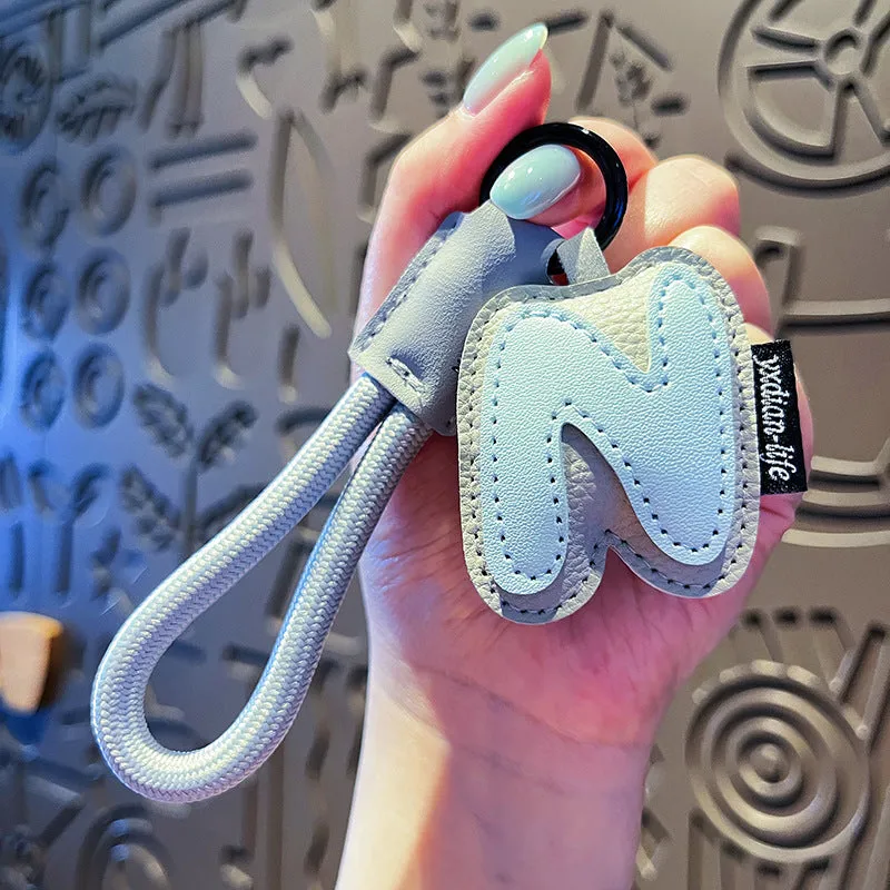 Leather keychain with letter O clip on a metal keyring, personalisation initial charm