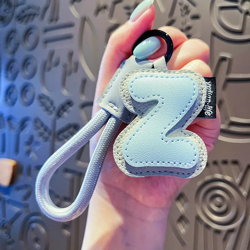 Leather keychain with letter O clip on a metal keyring, personalisation initial charm