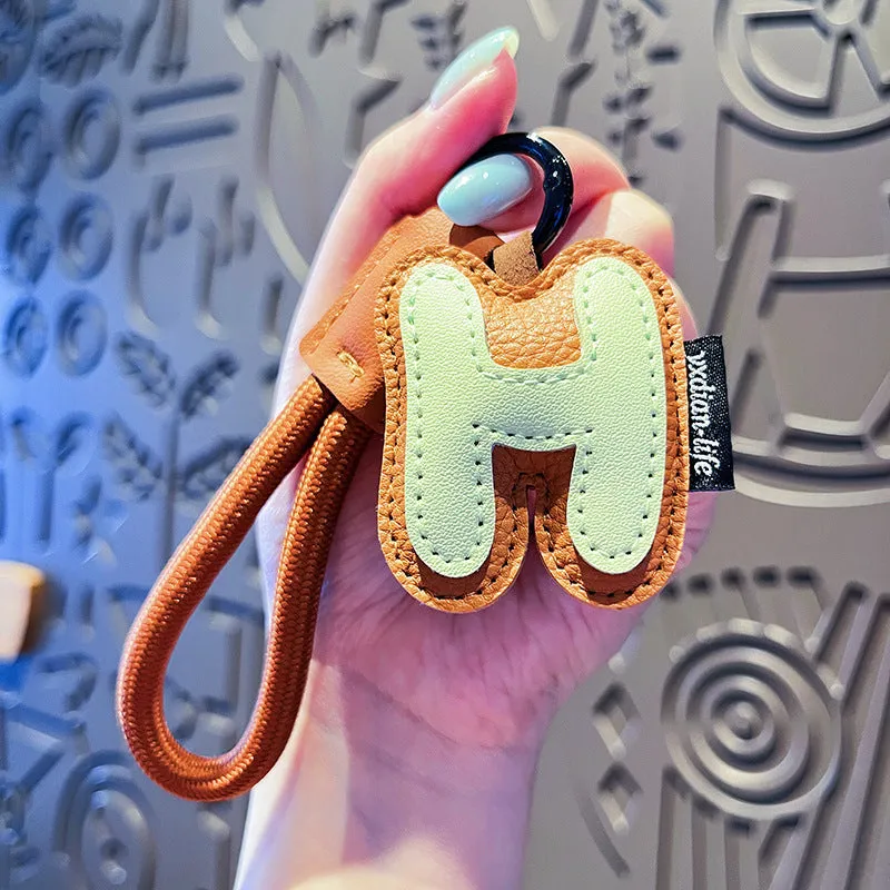 Leather keychain with letter O clip on a metal keyring, personalisation initial charm