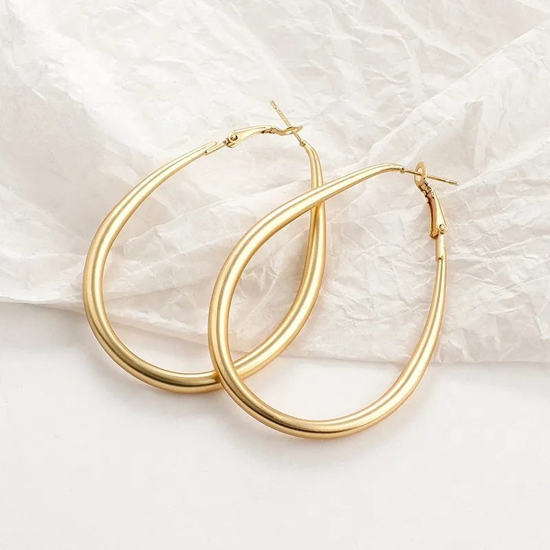 Women's simulated pearl and alloy earrings in gold colour, geometric shape
