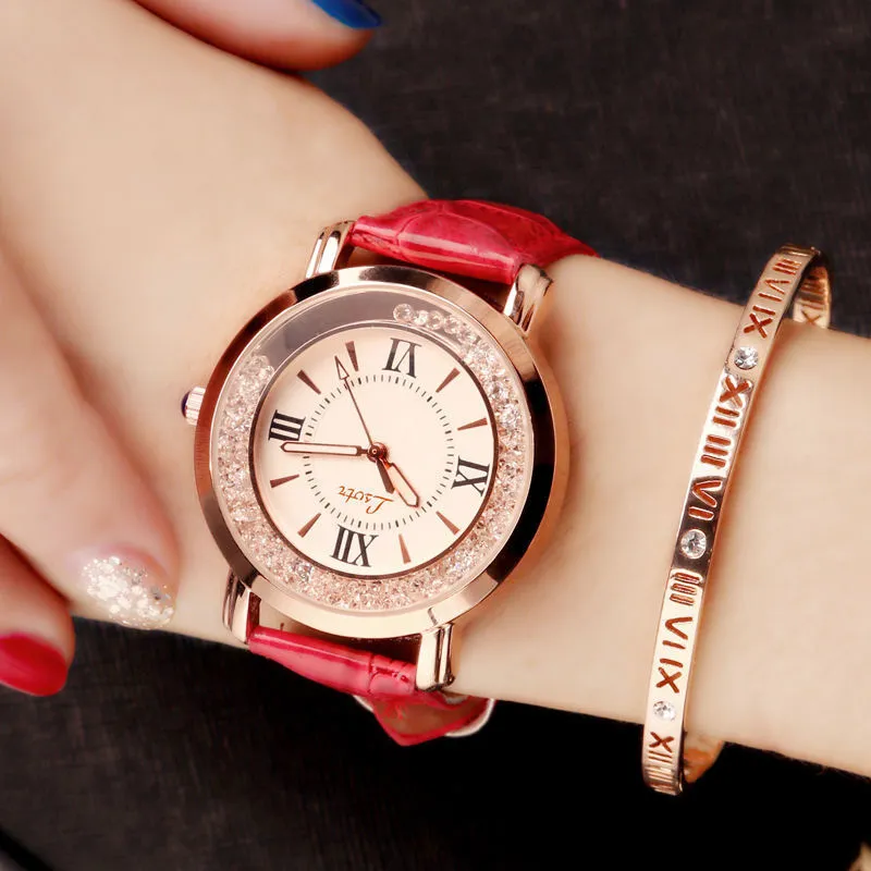 Ladies round metal case watch with white dial, rhinestone crown, and brown PU strap