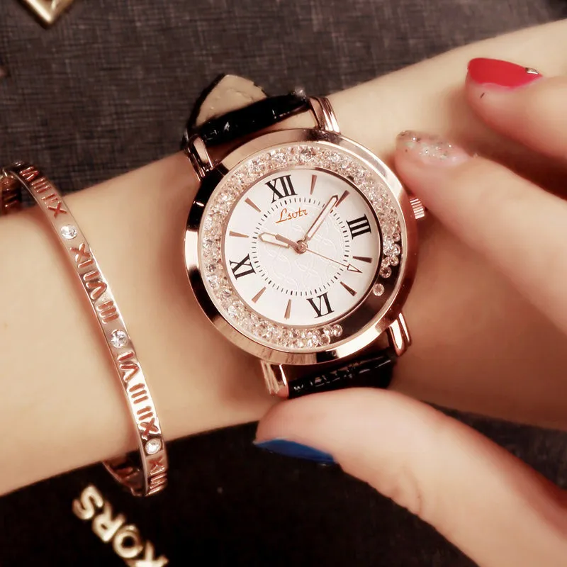 Ladies round metal case watch with white dial, rhinestone crown, and brown PU strap