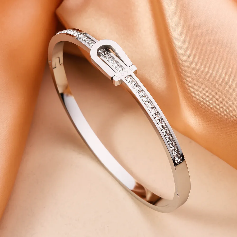 Gold plating titanium steel bracelet for women with electroplated finish, gold colour, on white background