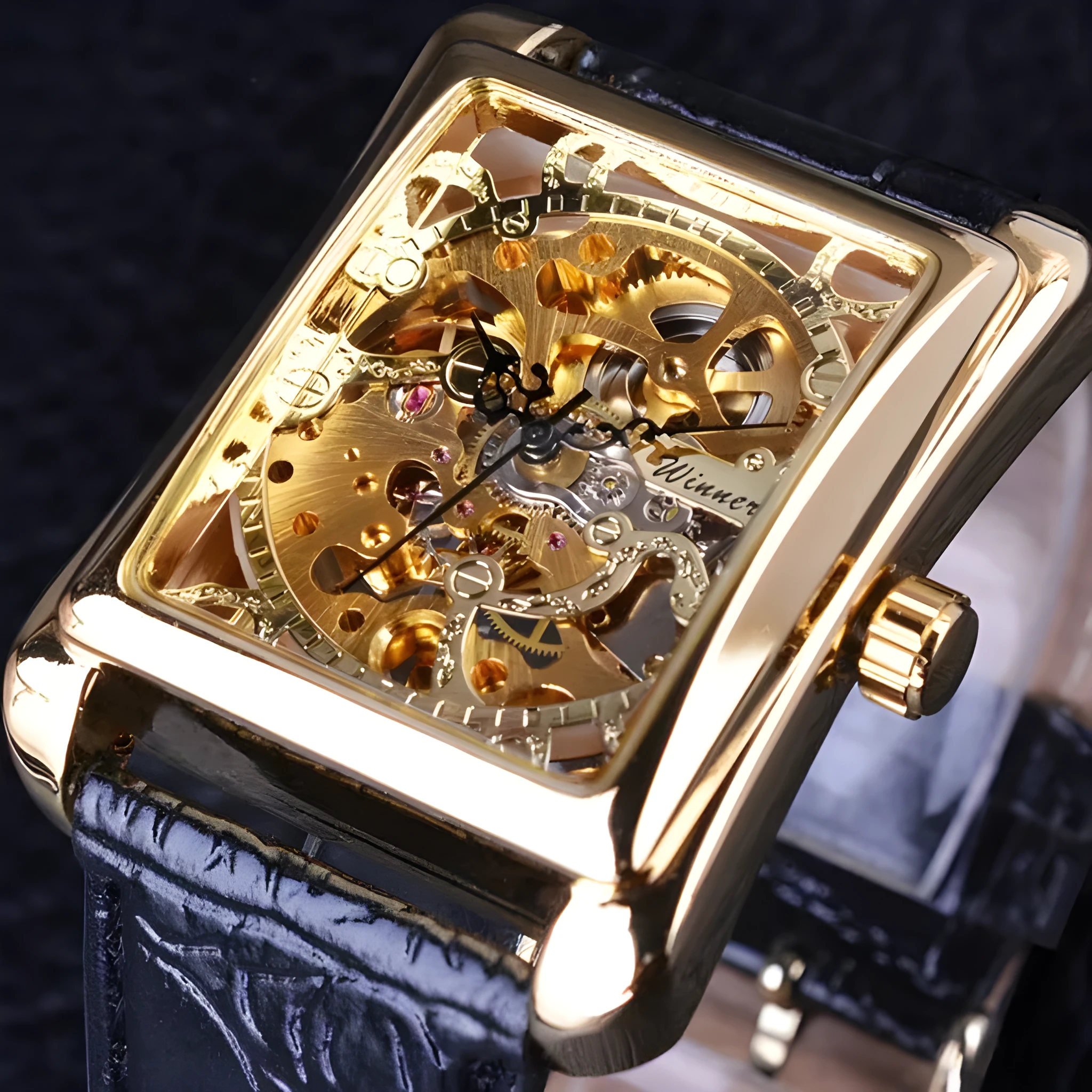 Winner men's fashion casual Swiss hollow manual mechanical watch with gold dial and black leather strap