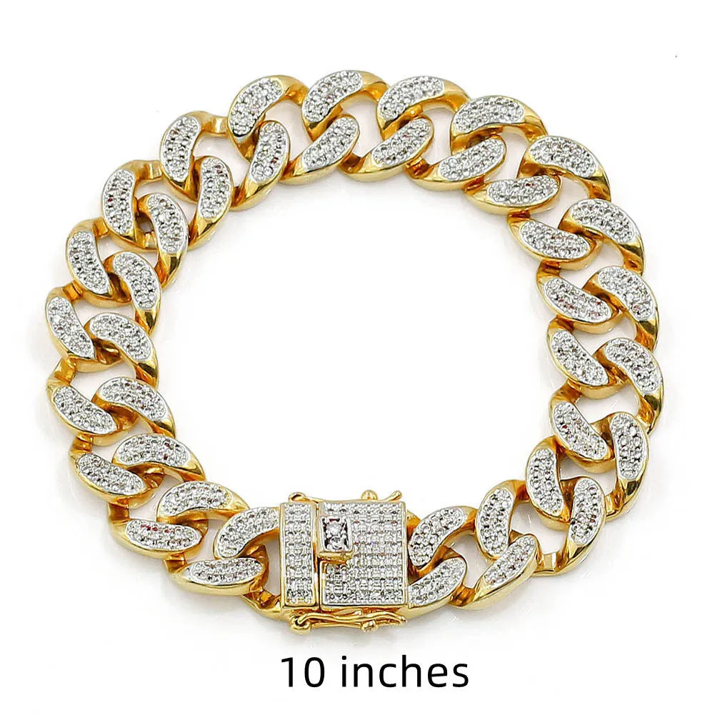 Men's Cuban chain bracelet with gold finish and geometric zircon pendant on a flat surface