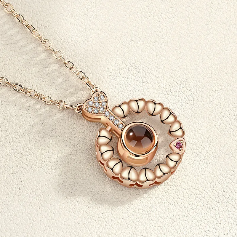 Gold love projection necklace with 100 languages pendant on 50cm copper chain