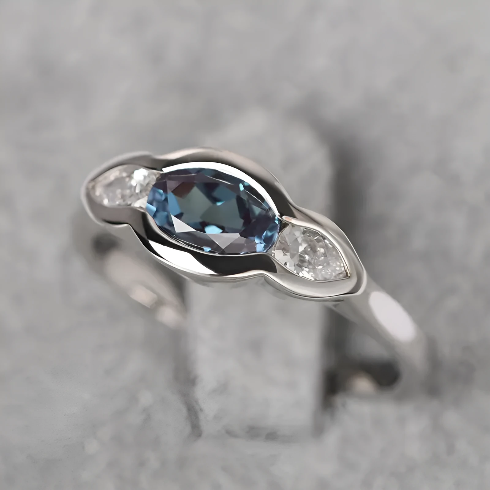 Geometric ellipse zircon ring in white gold colour on copper base