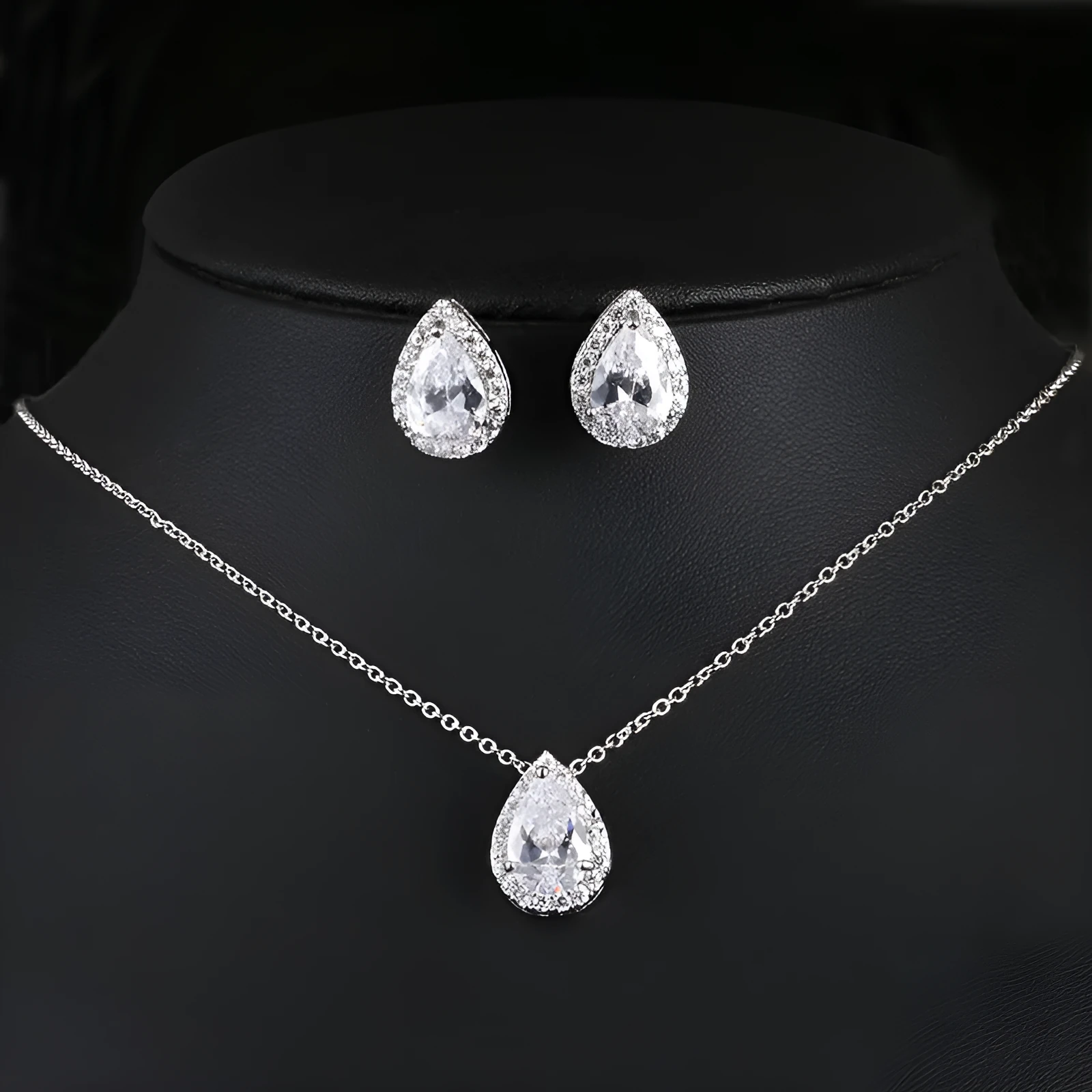 Women's water drop gemstone necklace and earrings jewellery set in copper and zircon, available in gold finish