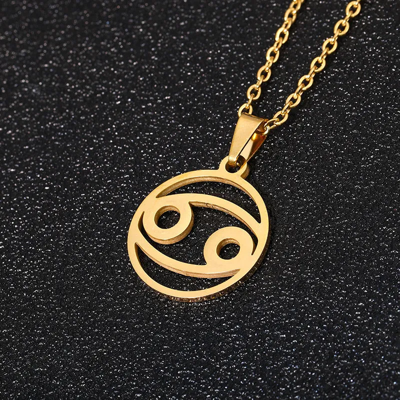 Set of 12 stainless steel horoscope pendant necklaces with vacuum plating gold finishes on a white background