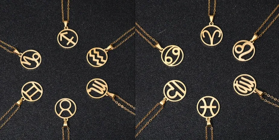 Set of 12 stainless steel horoscope pendant necklaces with vacuum plating gold finishes on a white background