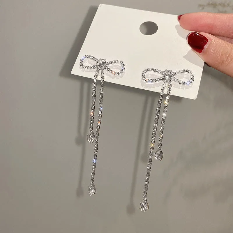 Fashion jewellery silver needle long bow tie full-jeweled stud earrings for women in gold and silver drop shape