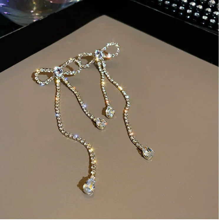 Fashion jewellery silver needle long bow tie full-jeweled stud earrings for women in gold and silver drop shape