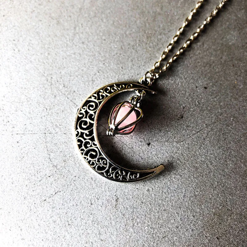 Alloy luminous pumpkin heart-shaped pendant necklace 50cm chain on display with glow effect