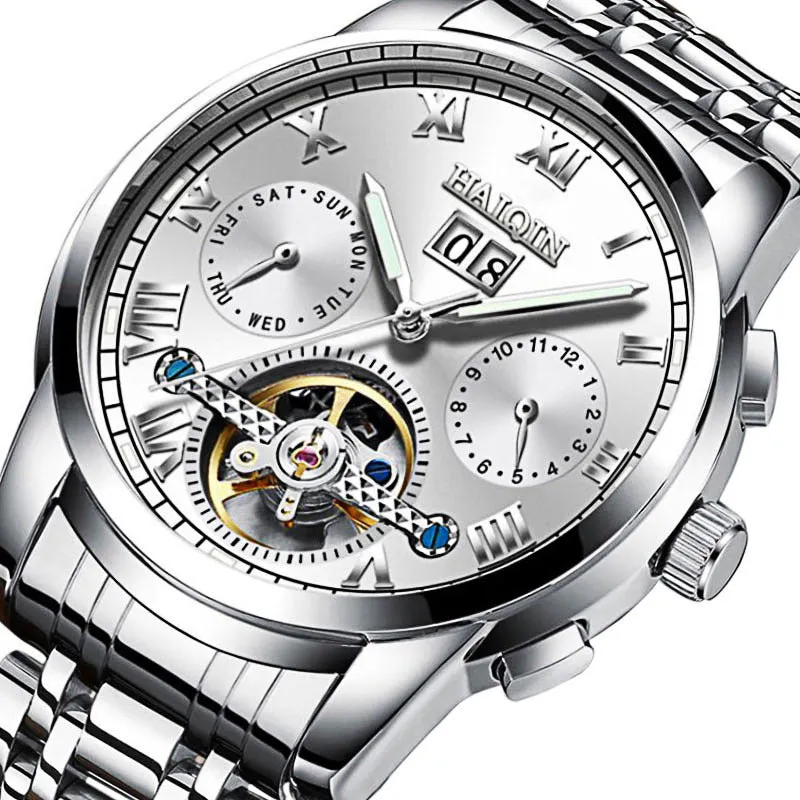 Men's luminous hollow tourbillon automatic mechanical watch with solid steel case and stainless steel strap on wrist
