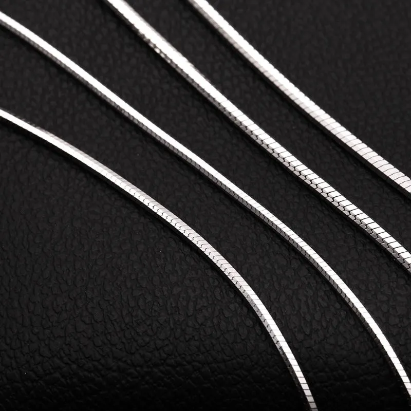 Sterling silver plated platinum necklace chain on display showing width and length options for men and women