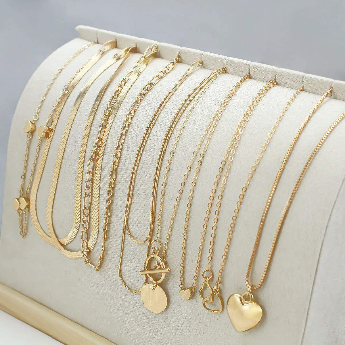 Gold electroplated women's necklace set with 10 pieces and adjustable snake bones chain