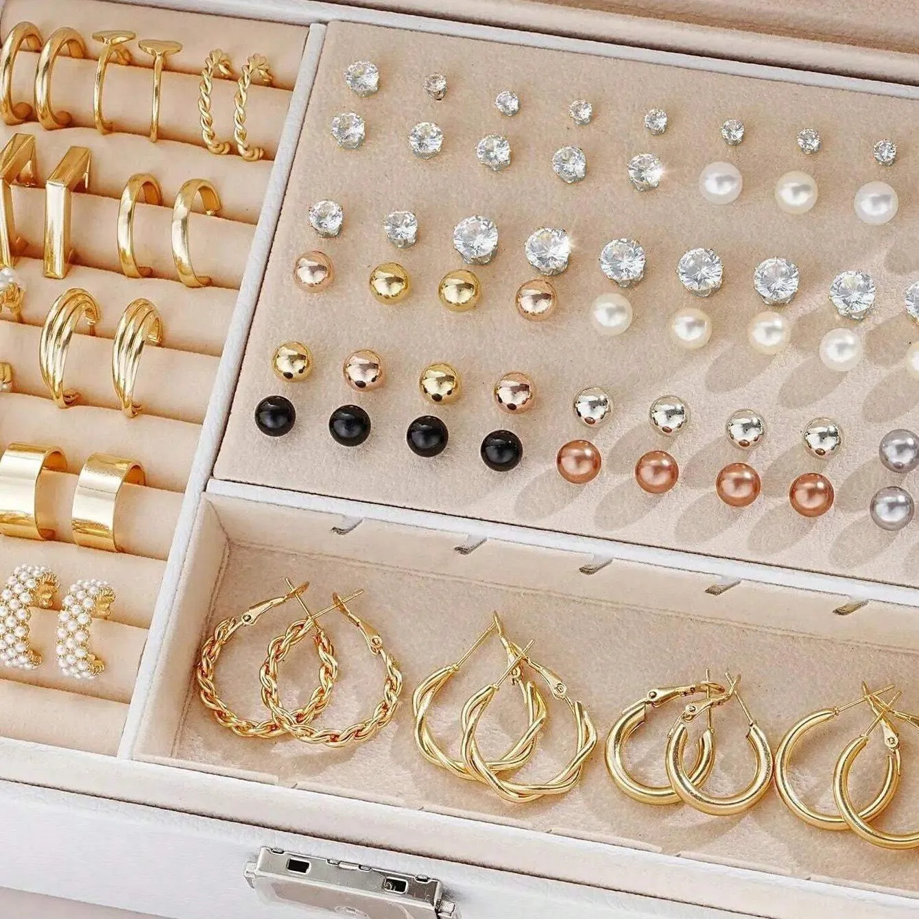 108-piece assortment of gold and yellow alloy stud earrings with geometric shapes and round pearls.