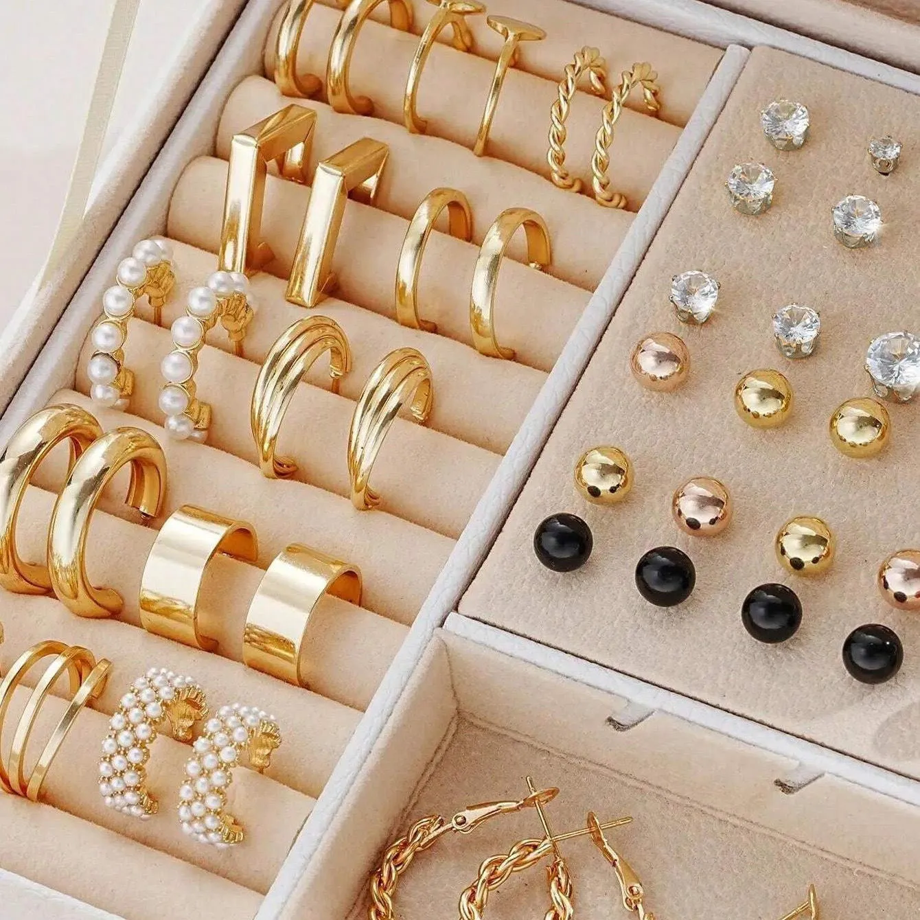 108-piece assortment of gold and yellow alloy stud earrings with geometric shapes and round pearls.