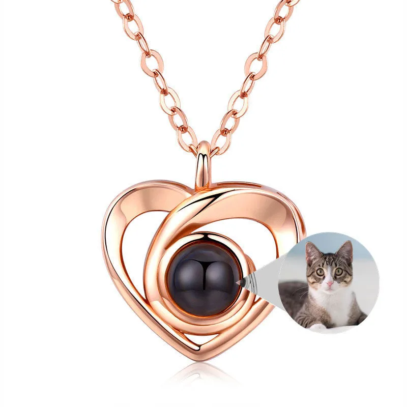S925 silver heart shaped photo projection pendant necklace with silver finish on white background