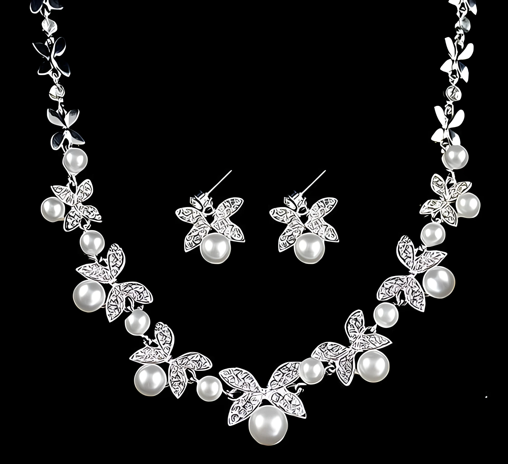 Bridal jewellery set with leaf design necklace and earrings featuring simulated pearls and cubic zirconia in silver white