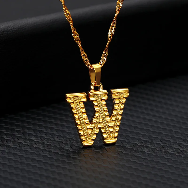 Gold-plated alloy initial pendant necklace with 42cm chain on white background