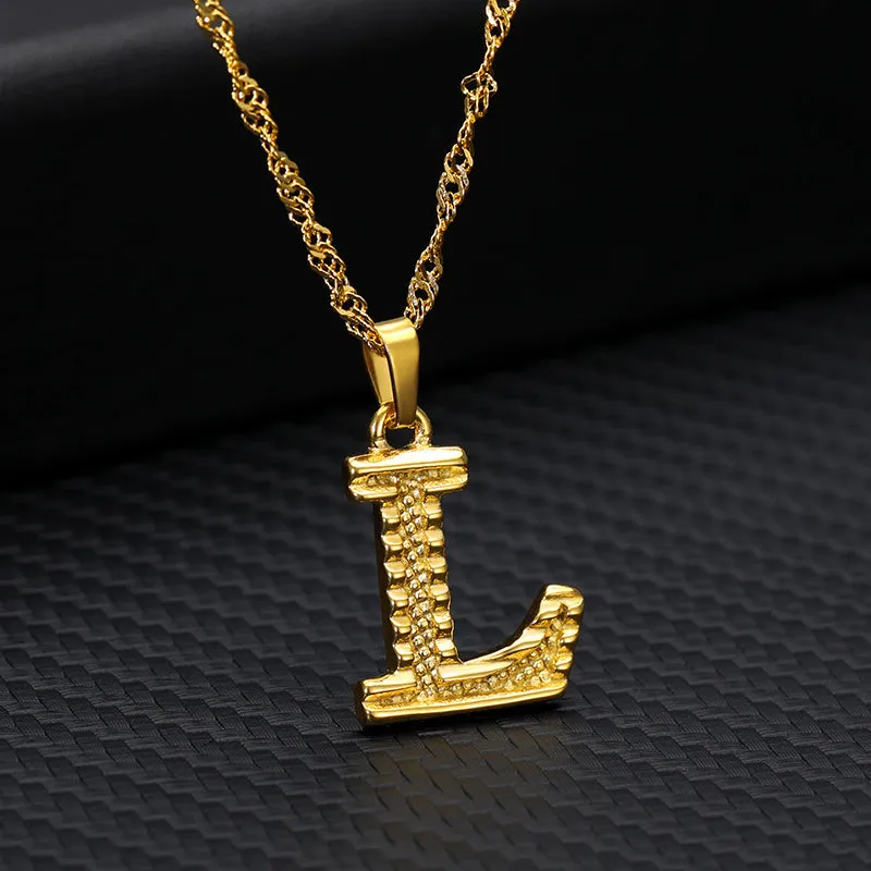 Gold-plated alloy initial pendant necklace with 42cm chain on white background
