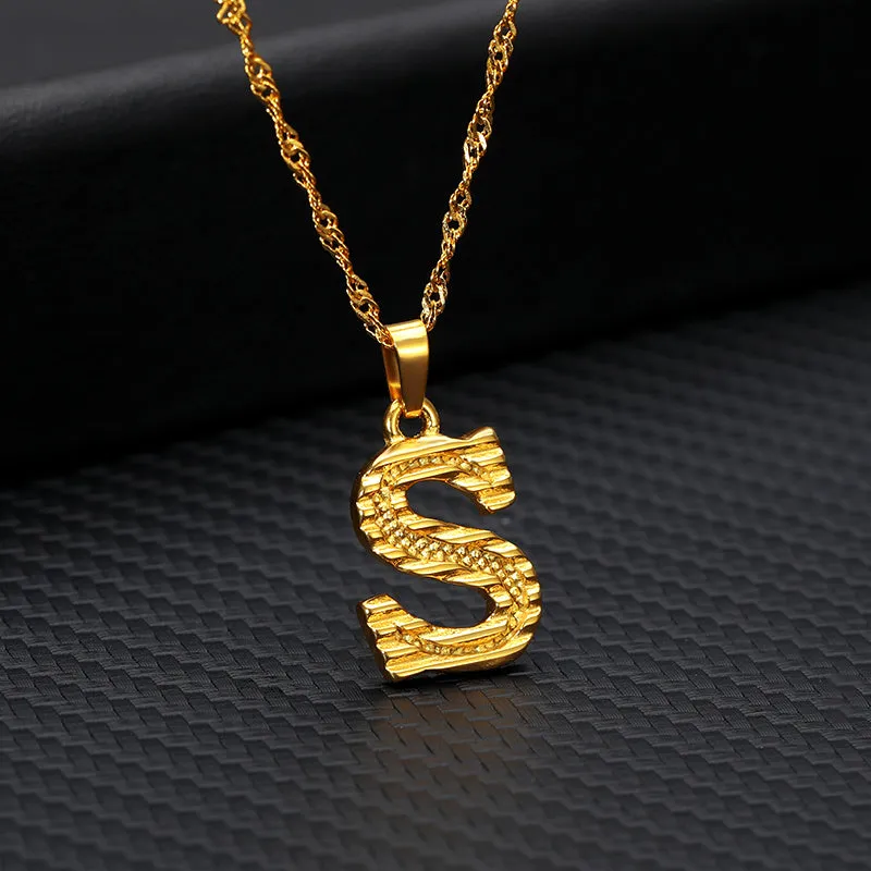 Gold-plated alloy initial pendant necklace with 42cm chain on white background