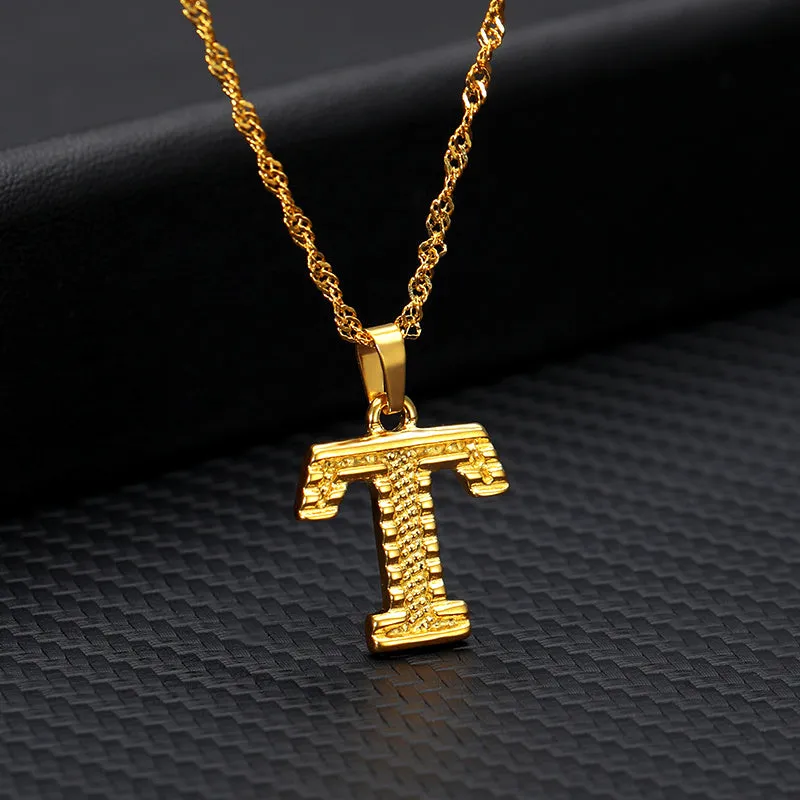 Gold-plated alloy initial pendant necklace with 42cm chain on white background