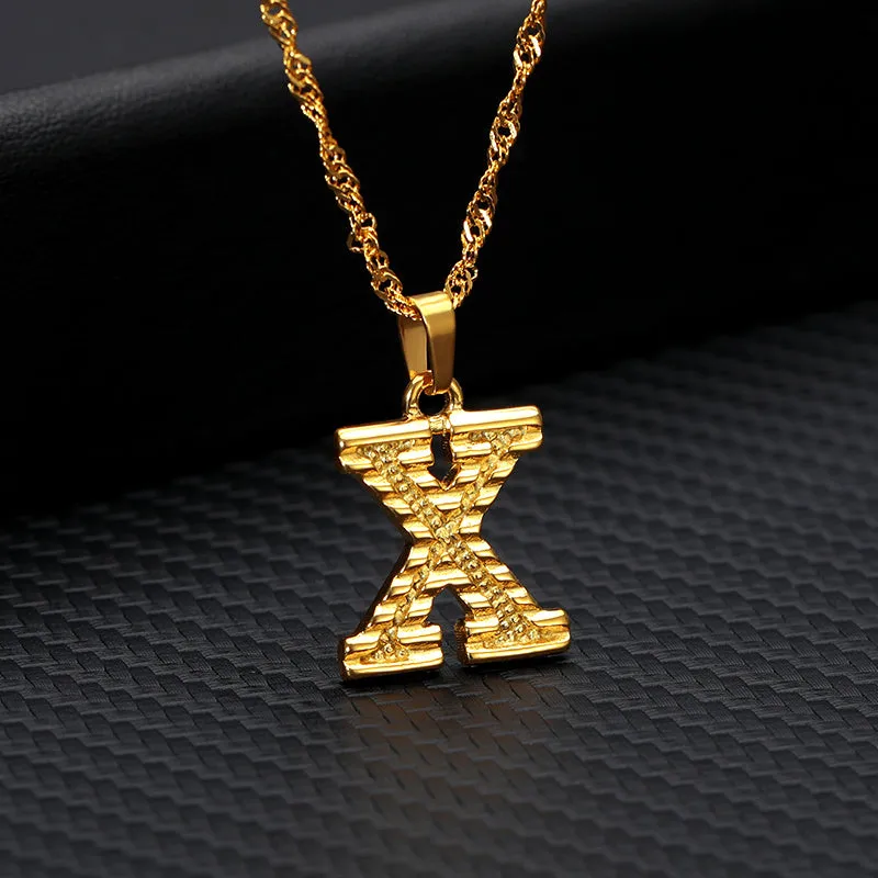 Gold-plated alloy initial pendant necklace with 42cm chain on white background