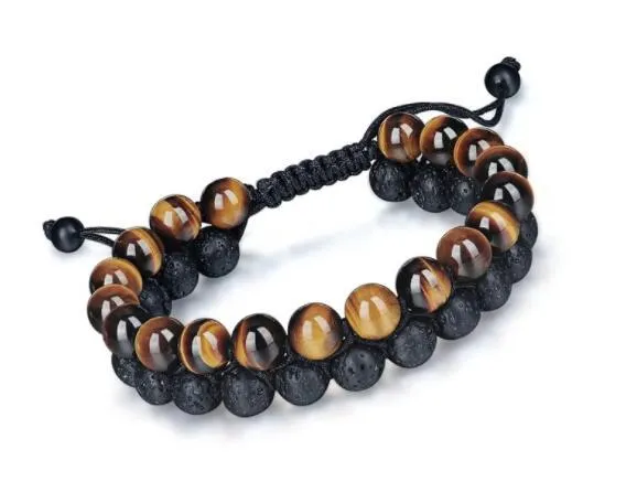 Tiger's Eye and Lava Stone bracelet on wrist, golden yellow tiger's eye and black lava beads