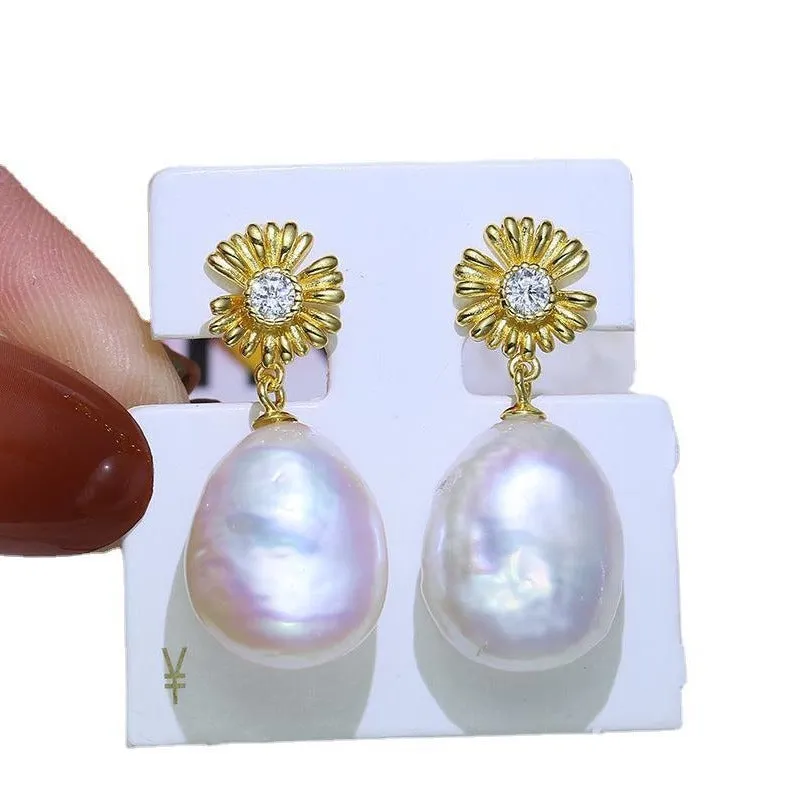 S925 sterling silver baroque flower earrings on a silver ring holder, showing gold and silver colour frame options.