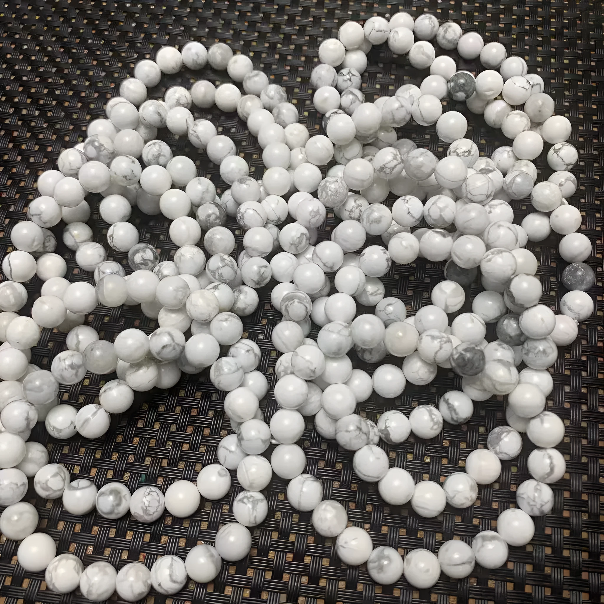 Natural white turquoise single circle bracelet with 8mm beads on a white background