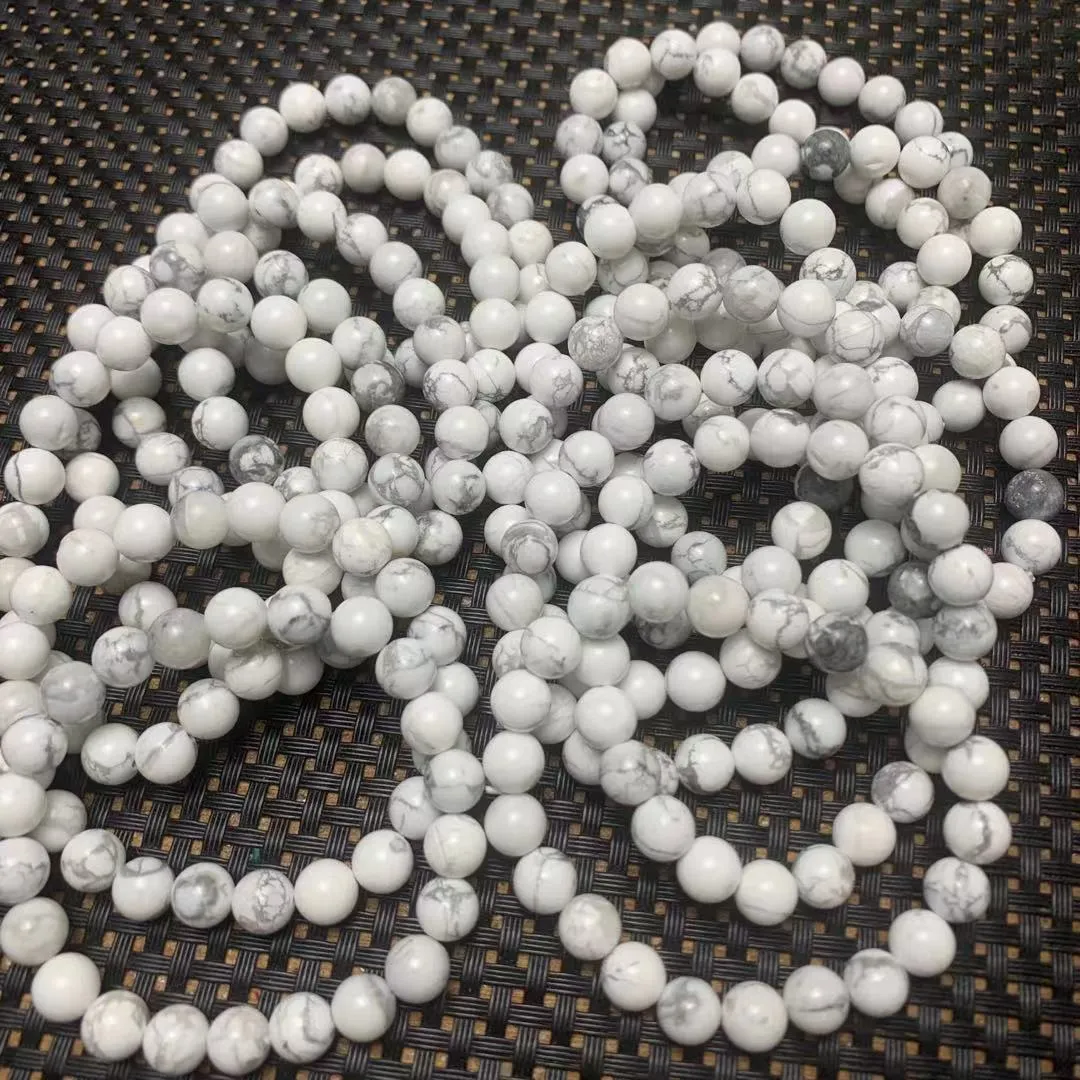 Natural white turquoise single circle bracelet with 8mm beads on a white background