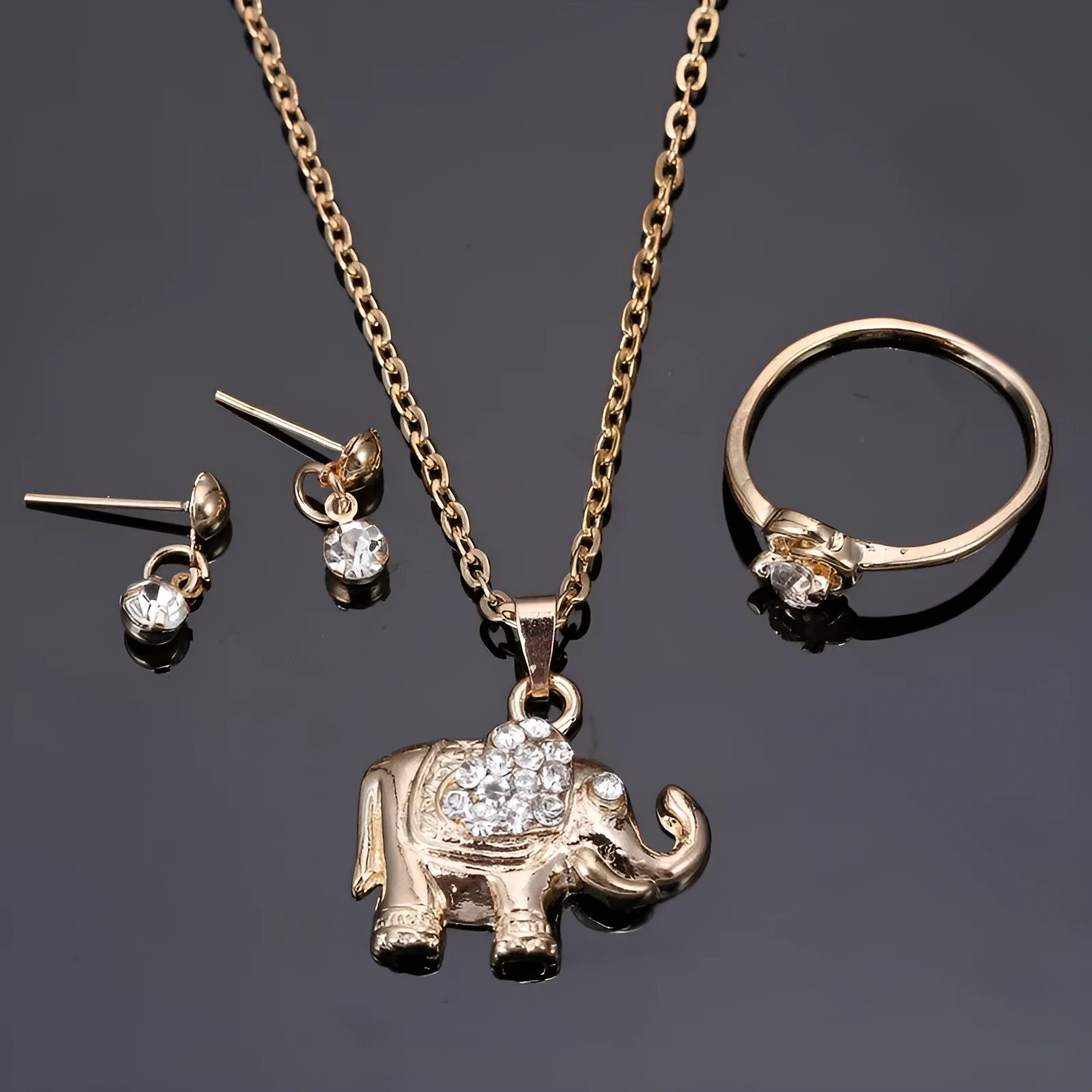 Mixed wholesale lot of animal pendants, necklaces, rings, earrings, jewellery sets, and bridal accessories from Yiwu