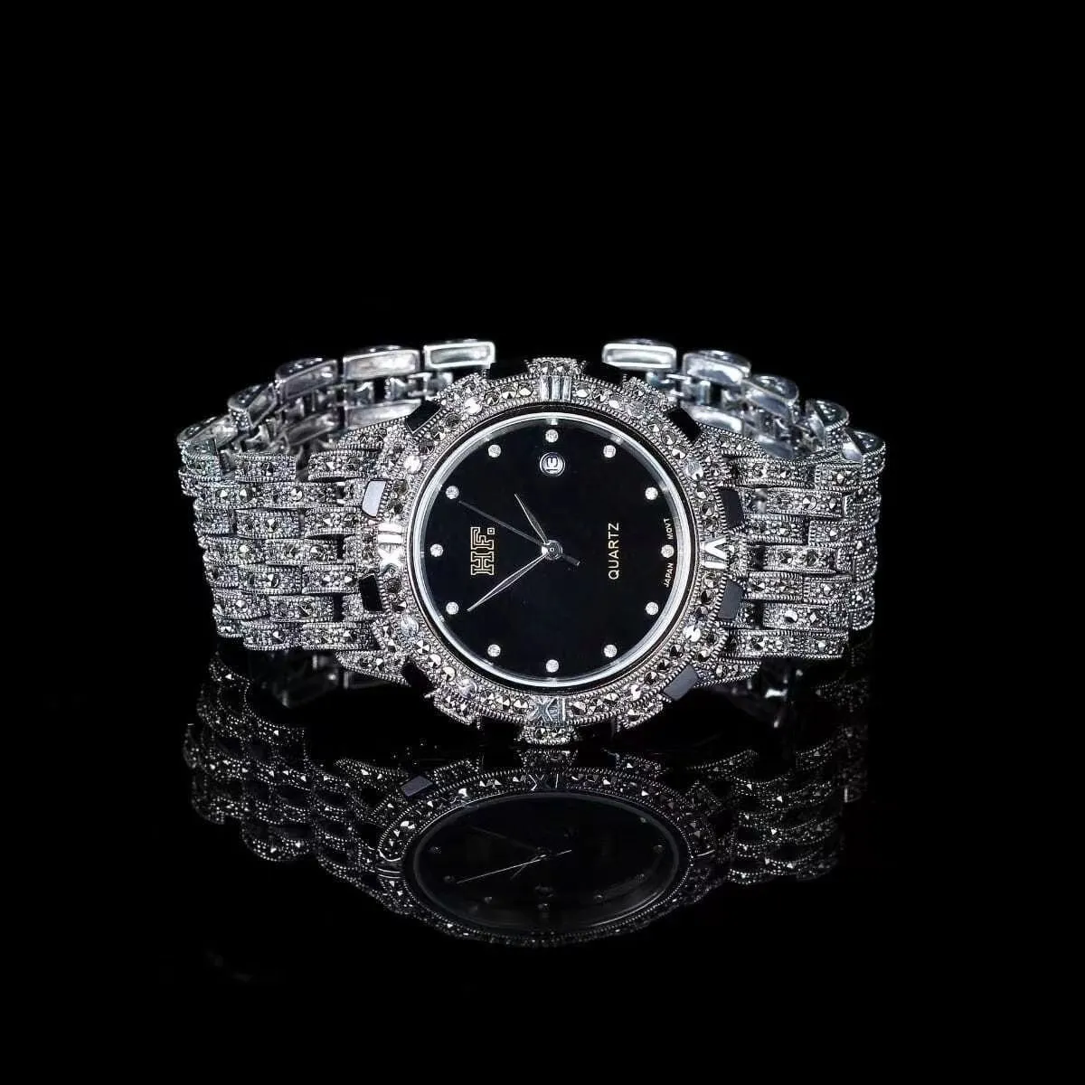 Quartz movement luxury romantic watch with metal strap, round dial, and jewellery buckle in black plate
