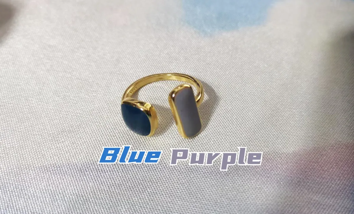 Blue purple alloy geometric dripping ring with plating finish on a white background