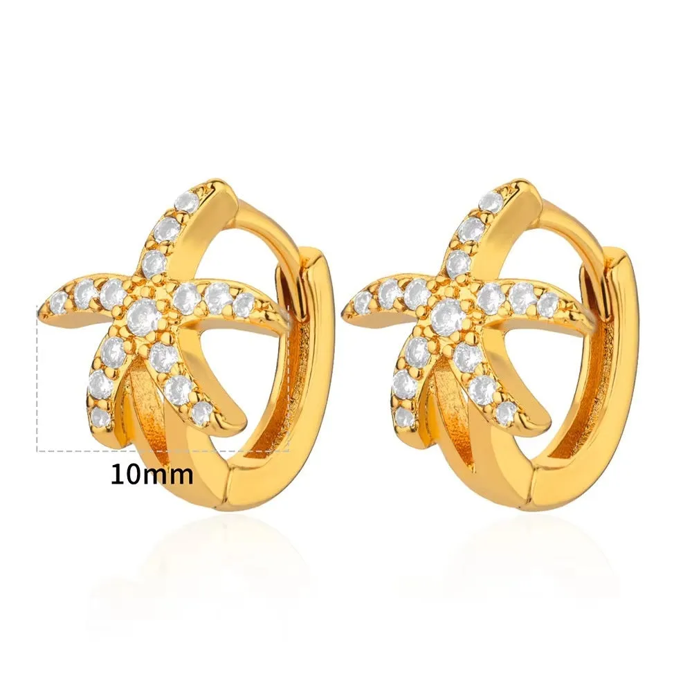 Women's geometric butterfly earrings in copper with heart and star details