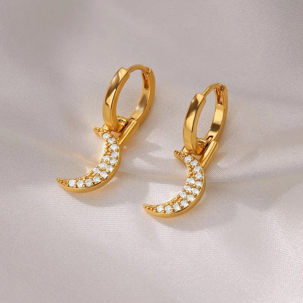 Women's geometric butterfly earrings in copper with heart and star details
