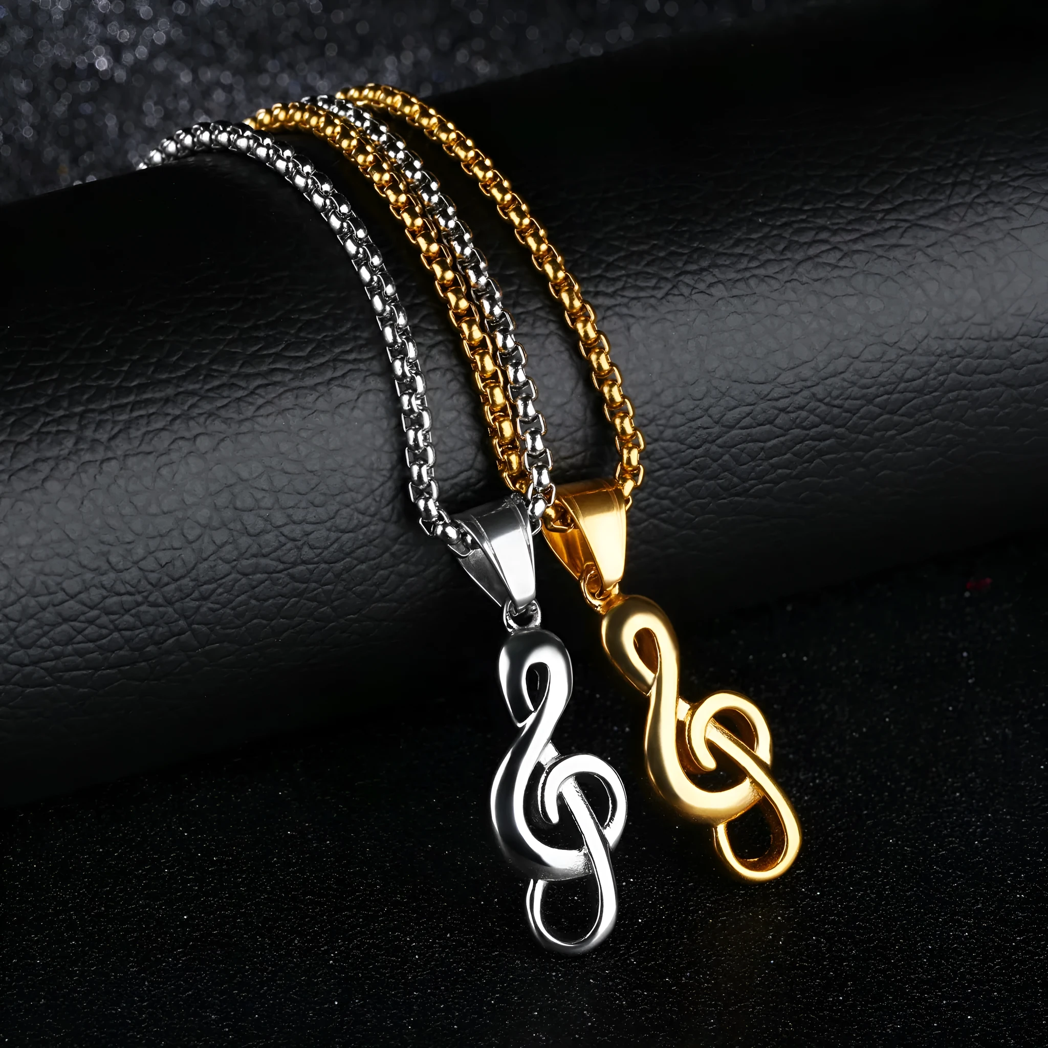 Gold music symbol pendant made from titanium steel on a chain