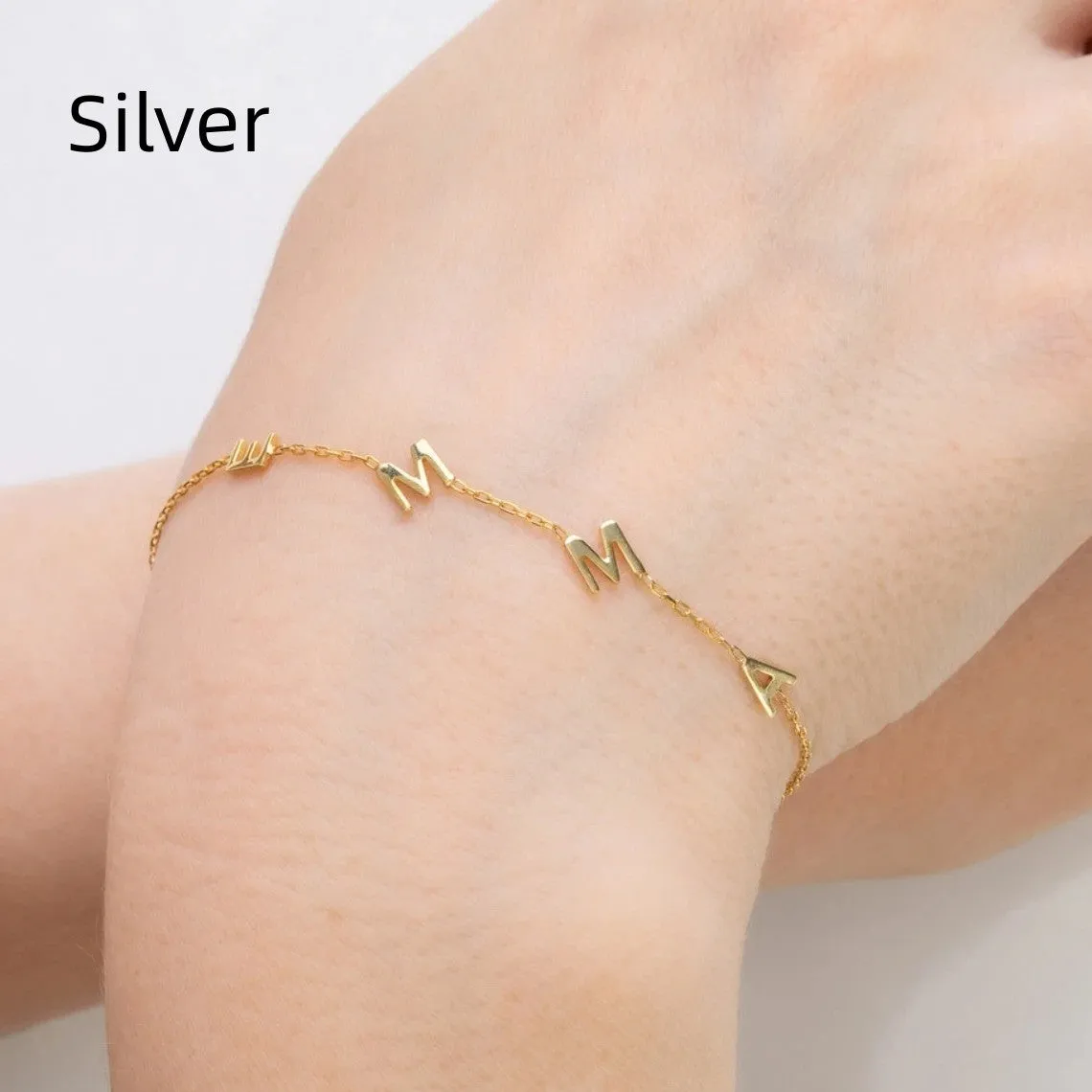 Gold stainless steel custom name bracelet with heart charm and personalised initials