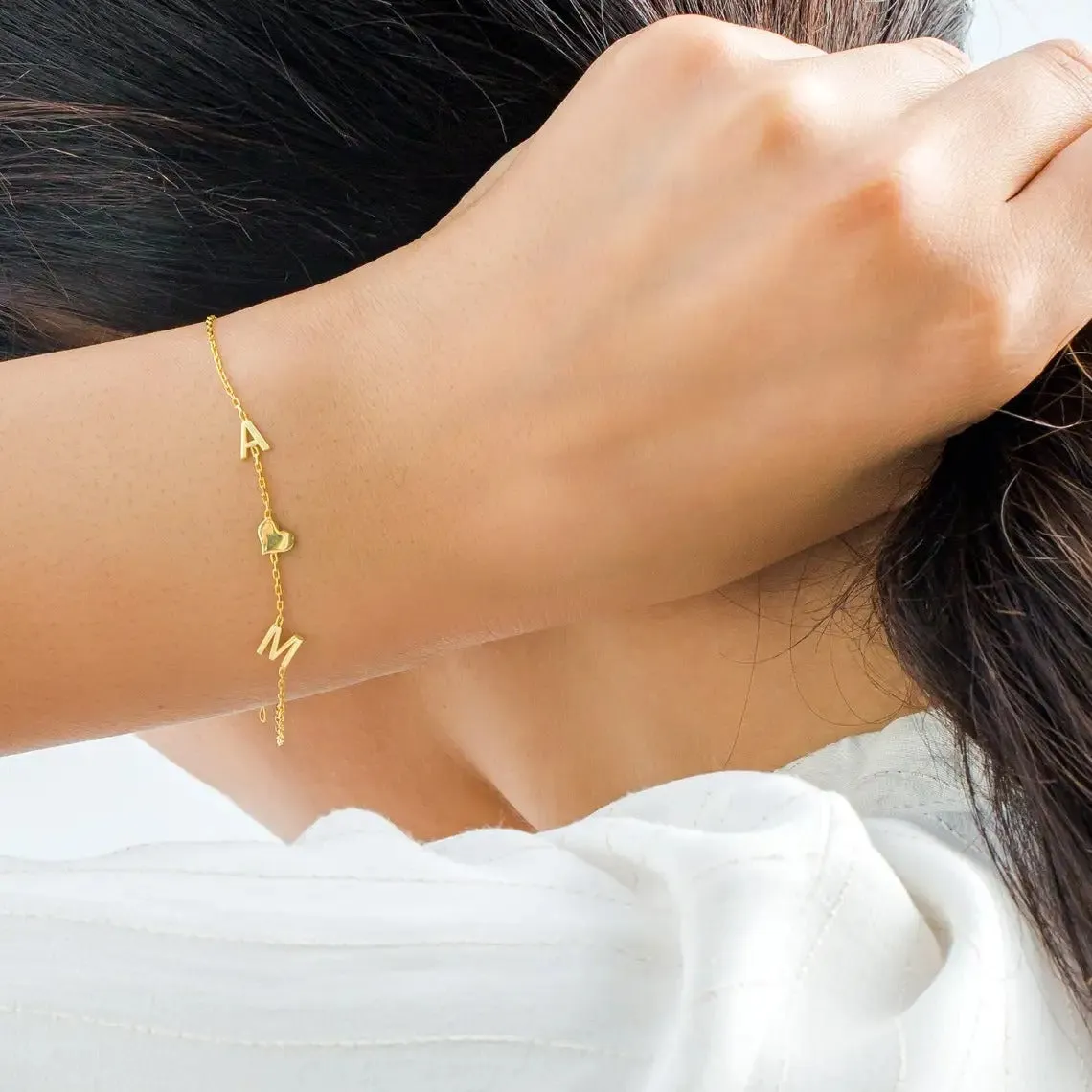 Gold stainless steel custom name bracelet with heart charm and personalised initials