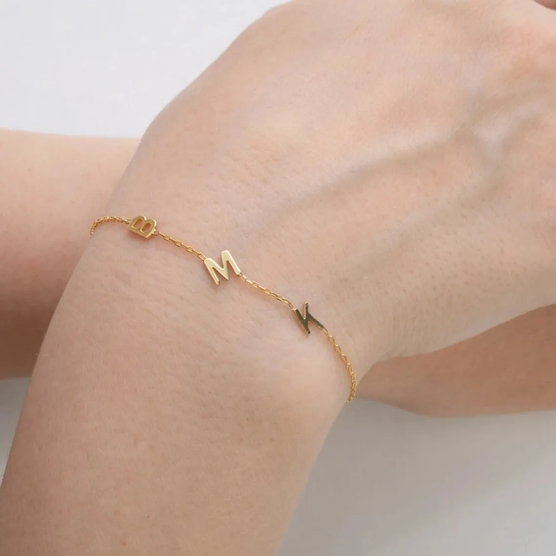 Gold stainless steel custom name bracelet with heart charm and personalised initials