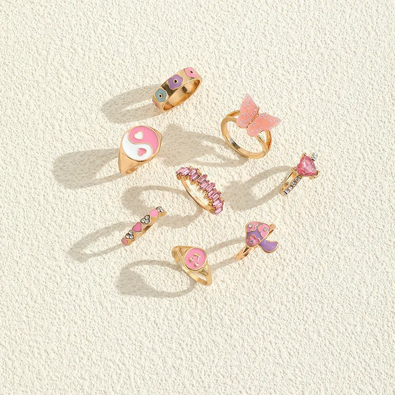 Set of 8 zinc alloy colour dripping rings with plant and flower motifs in European style