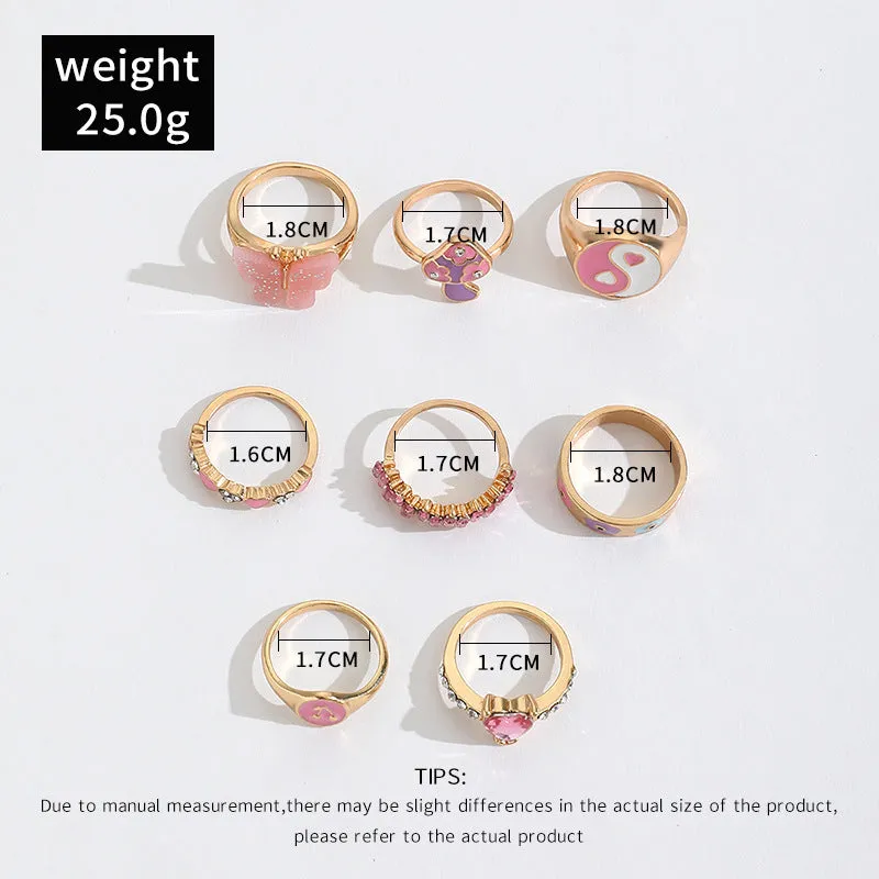 Set of 8 zinc alloy colour dripping rings with plant and flower motifs in European style