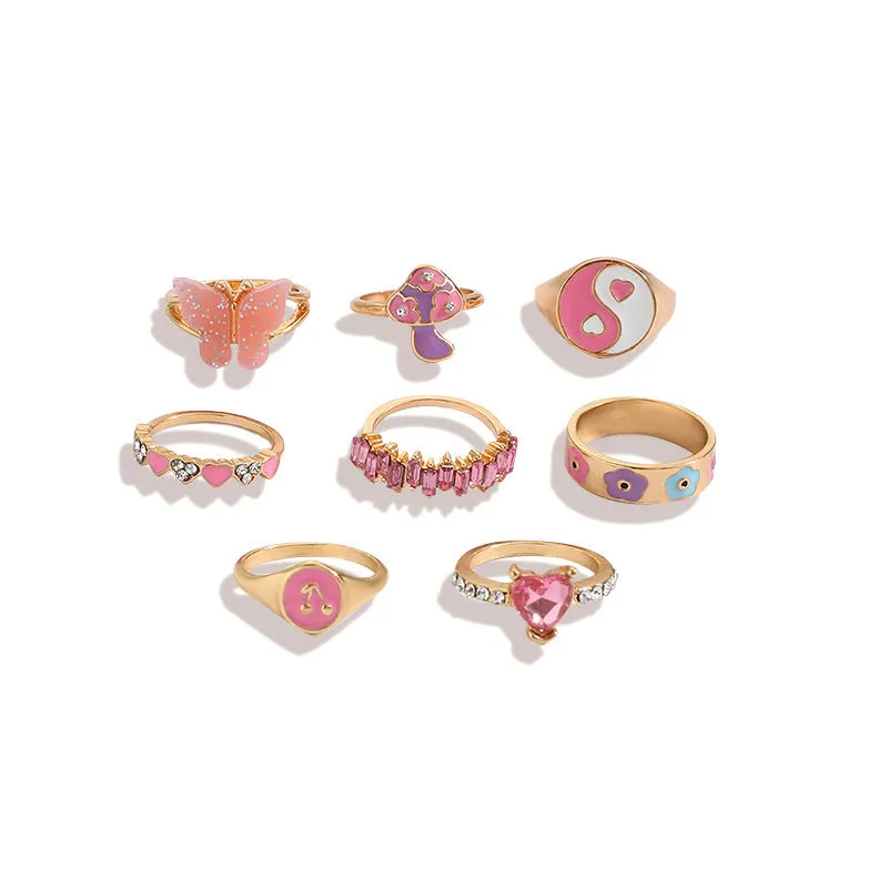Set of 8 zinc alloy colour dripping rings with plant and flower motifs in European style
