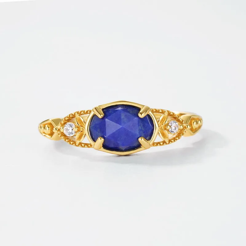 Japanese style silver lapis lazuli ring with elliptical geometric design and round stone centre