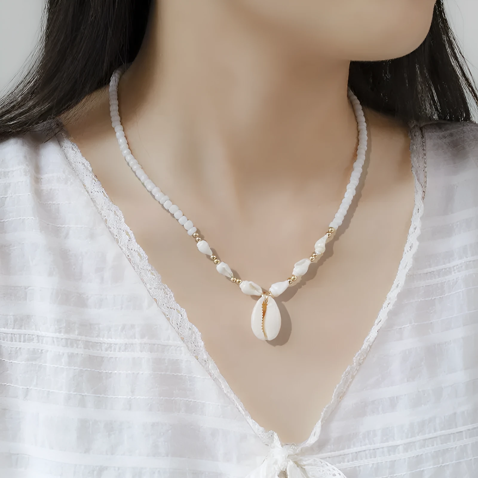 White conch bead necklace with mother pearl shellfish pendant on regular chain