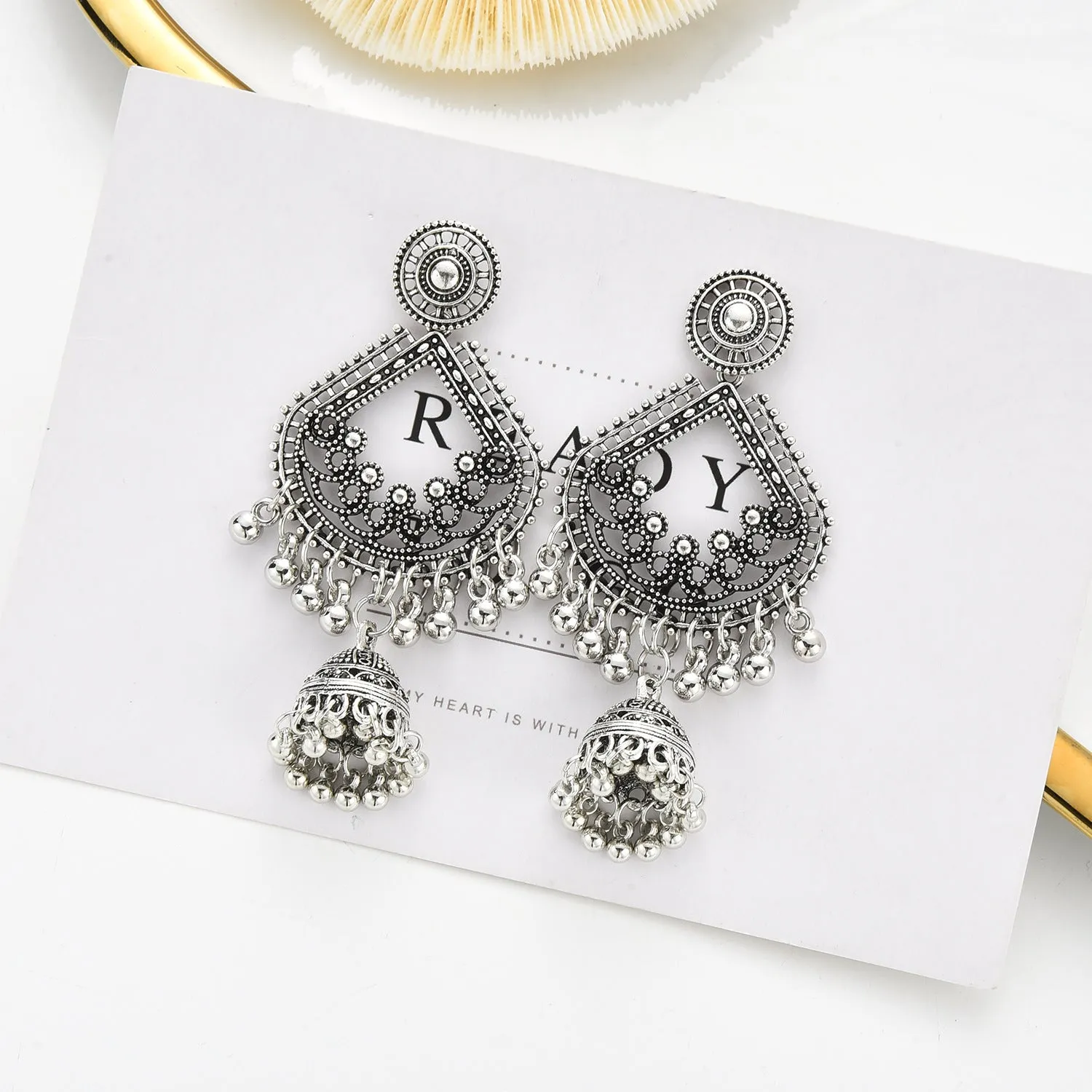 Gold bell tassel earrings with diamond lens centre and alloy inlaid artificial gemstone