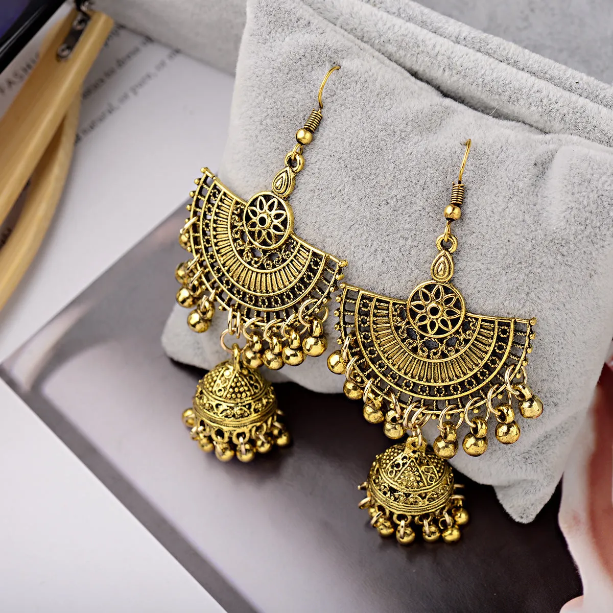Gold bell tassel earrings with diamond lens centre and alloy inlaid artificial gemstone