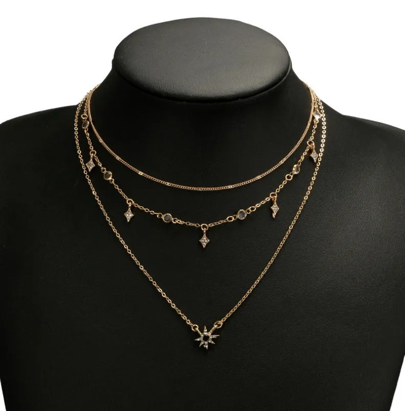 Handmade alloy multi-layer star pendant necklace in gold colour with layered chains and star pendants